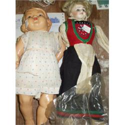 TWO CHINA DOLLS, ONE DAMAGED. 