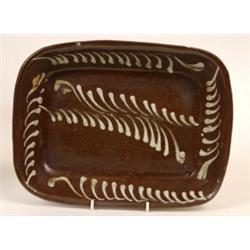 A 19th Century Earthenware Rectangular Dish, with slip glazed decoration, 32 cm  See illustration...