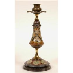 A Doulton Lambeth Stoneware Candlestick, decorated stylised flowers by Frank Butler, 24 cm  Se il...
