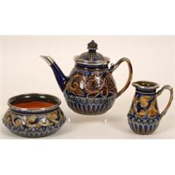 A Doulton Lambeth Silver Mounted Three Piece Service, with stylised leaf decoration, stamped No 1...