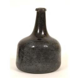 A 17th Century Onion Shaped Glass Wine bottle, 17 cm,  See illustration  £150-200...