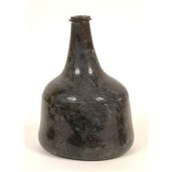 A 17th Century Onion Shaped Glass Wine Bottle, 19 cm  See illustration  £150-200...