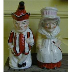 A Pair of Victorian Staffordshire Jugs, with covers, in the form of Punch and Judy (a.f.) 30 cm (...