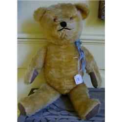 A Blonde Plush Teddy Bear, with growler, 50 cm  £20-30...
