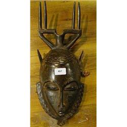 An African Yaure Tribe Carved Hardwood Mask, 47 cm  £120-140...