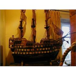 A Painted Wood Model of HMS Victory, 122 cm  £300-400...
