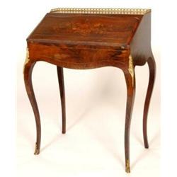 A Rosewood Bonheur Du Jour, with a brass 3/4 gallery, floral marquetry inlaid fall front and cabr...