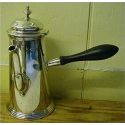 An 18th Century Style Silver Coffee Pot, London 1908  £120-140...