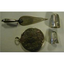 A Circular Silver Vesta, with engraved decoration, Chester 1904, a silver trowel bookmark and two...