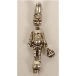 A Silver Novelty Mr Punch Childs Rattle, with articulated head whistle, two bells (only one shown...