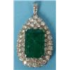 Image 1 : An 18 ct White Gold Tear Drop Pendant, set a large emerald within 45 diamonds  See illustration...