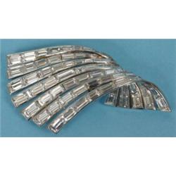 A Platinum and Diamond Brooch, of 1940's Design, set 77 baguette cut diamonds, also dividing into...