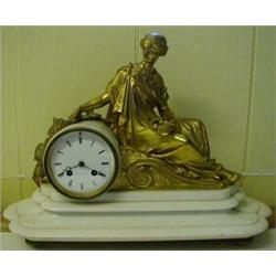 A 19th Century French Mantle Clock, in a white marble case, with a gilt brass classical lady surm...