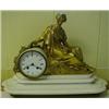 Image 1 : A 19th Century French Mantle Clock, in a white marble case, with a gilt brass classical lady surm...