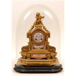 A Late 19th Century French Gilt Spelter Clock, with cherub surmount, and pink painted porcelain p...
