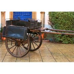 A Victorian Jaunting Cart, the wheels 104 cm  See illustration  £500-550...