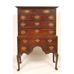 An Early George III Oak Chest on Stand, the moulded cornice above two short and three graduated l...