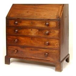 A George III Mahogany Bureau, the fall front above four graduated long drawers, on bracket feet,...