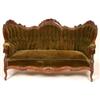 Image 1 : A 19th Century American Style Settee, the walnut frame carved with floral bouquets, the deep butt...