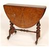Image 1 : A Victorian Burr Walnut Sutherland Table, on carved baluster end supports joined by a fold stretc...