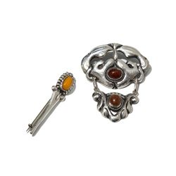 Two Skonvirke Silver Brooches with Amber, Denmark, around 1910