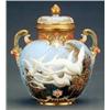 Image 1 : WORCESTER - A Royal Worcester ovoid vase and cover, the borders of gilt and small pierced panels...