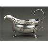 Image 1 : SILVER - A good small George III sauceboat, with spirally fluted and gadrooned rim, on three she...