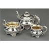 Image 1 : SILVER - A decorative George IV three-piece tea service, of compressed baluster form, on four sh...
