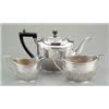 Image 1 : SILVER - An Edwardian three-piece boat shaped oval tea service, half lobed, the teapot with ebon...