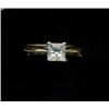 Image 1 : JEWELLERY AND WATCHES - A single-stone diamond ring, c.2000, the princess cut stone mounted with...