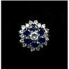 Image 1 : JEWELLERY AND WATCHES - A sapphire and diamond cluster ring, c.1970, the larger central brillian...