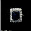 Image 1 : JEWELLERY AND WATCHES - A large sapphire and diamond cluster ring, c.1975, the central claw set...