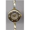 Image 1 : JEWELLERY AND WATCHES - A lady's wristwatch, c.1890, the silvered dial with Arabic numerals and...