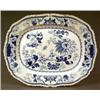Image 1 : BRITISH POTTERY - An ironstone large rectangular meat dish, printed with flowers and coat of arm...