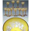 Image 1 : GLASS - A set of seven yellow wine glasses, engraved with a band of fruiting vine...