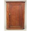 Image 1 : FURNITURE AND DECORATIONS - A George III oak splay front hanging corner cupboard, the green pain...