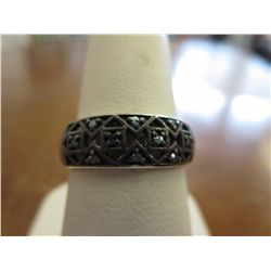 Rare blue diamond ring set in silver