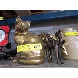 3 brass decorations