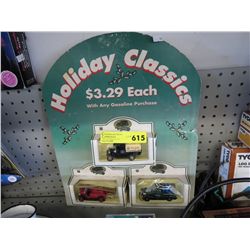 Vintage advertising sign with model cars