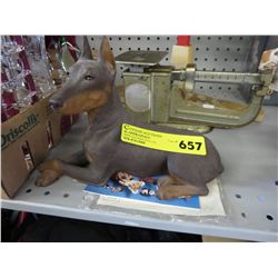Sandicast sculpture of a Red Doberman