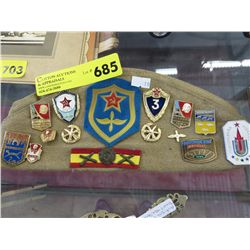 Vintage Russian military cap & assorted badges