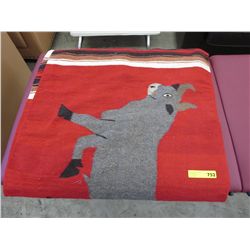Vintage Mexican weaving with bull motif