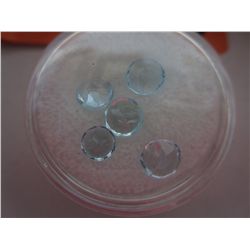 Five blue topaz gemstones