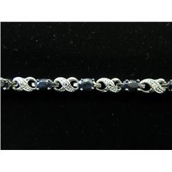 Ladies blue sapphire & diamond tennis bracelet