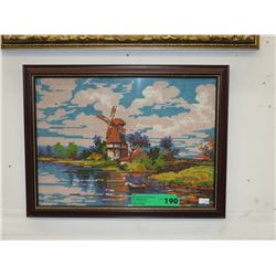 Needle work picture of a windmill