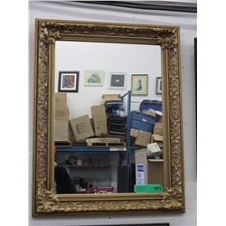 Gold framed wall mirror
