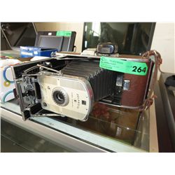 Vintage Polaroid accordion style camera