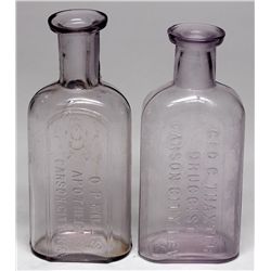 Two Carson City purple Druggist Bottles