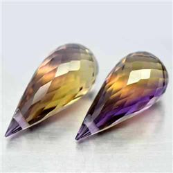 PAIR OF 38.86 CTS PURPLE & GOLDEN BOLIVIAN AMETRINE