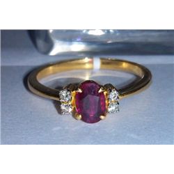 2.34g Ring made of 18kt Gold , 0.08 Ct Diamond and 0.48 Ct Ruby